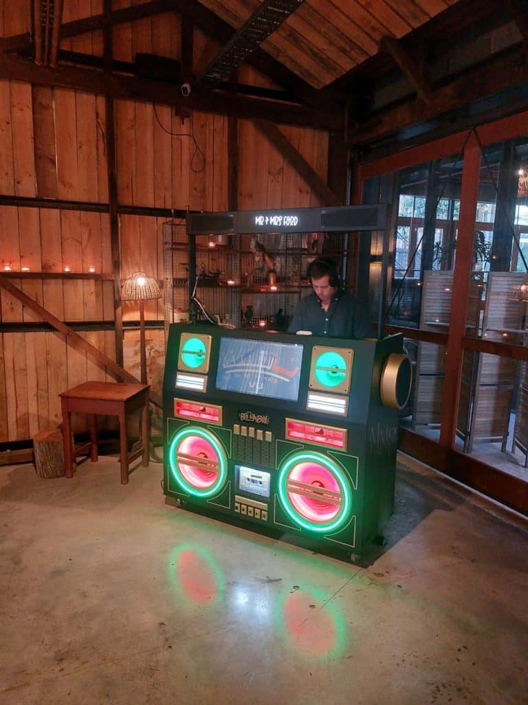 Memories Made and Personalised - Dj Stands in Front of a Large Boombox -  - Boombox Dj Hire | Sunshine Coast to Brisbane | Mmp Events